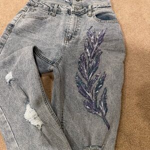 Jumpsuit light blue, painted floral design. Size 3-5 junior.